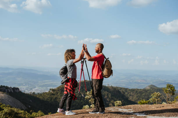 istock Backpacker couple on mountain trail 1437945852