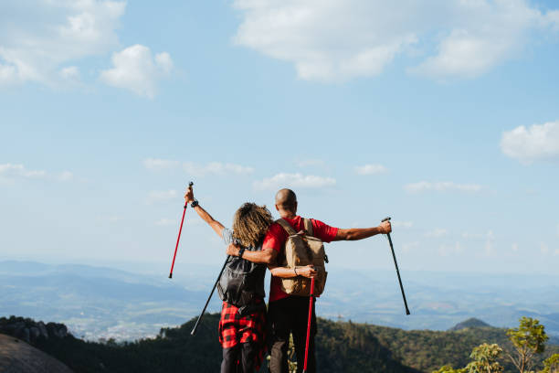 istock Backpacker couple on mountain trail 1437945853