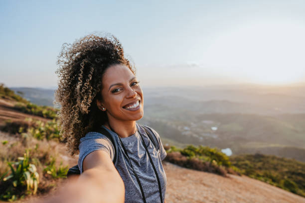 istock Backpacker woman taking selfie 1437946755