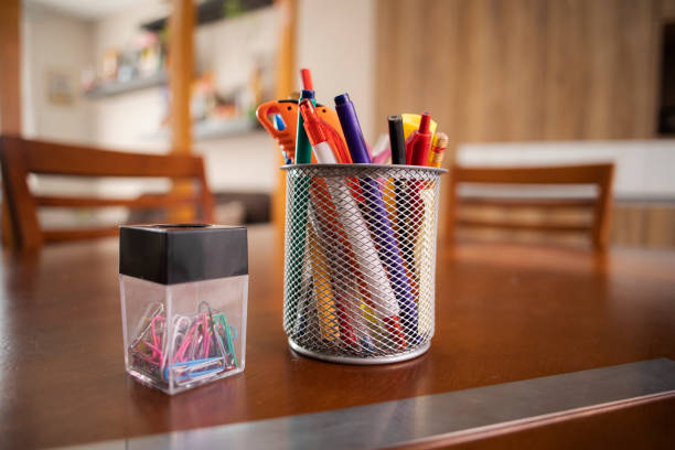 Stationery in the organizer on the table