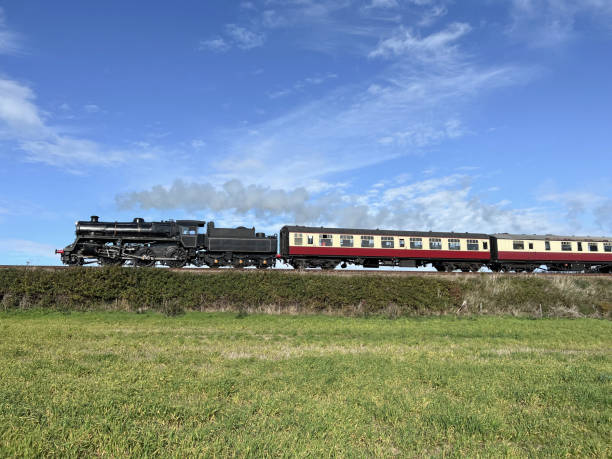 istock Steam train traveling in Norfolk, UK 1437949656