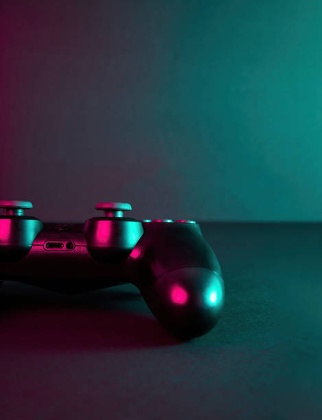 istock Closeup shot of a gaming console under a pink light 1437954118
