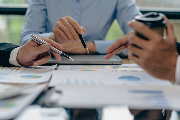 istock Business team discuss work analysis with graph data, market growth report, presentation and brainstorming on profit strategy planning, financial investment advisor, company accounting ideas. 1437954349