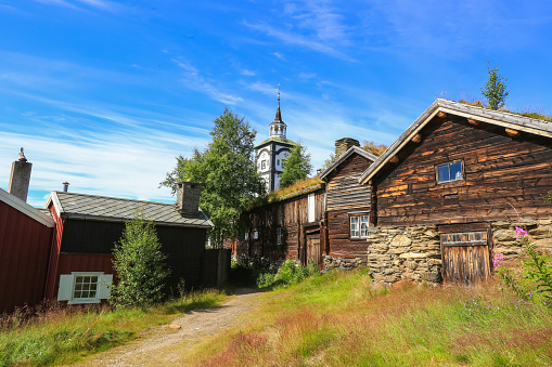 Street with old timber houses in Roeros. Roeros  is a municipality in Trøndelag county, Norway and also the mining town .
