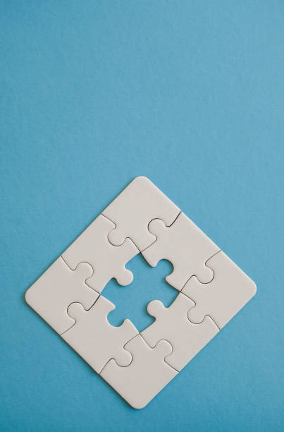 jigsaw puzzle pieces forming partial figure. - 2547 imagens e fotografias de stock