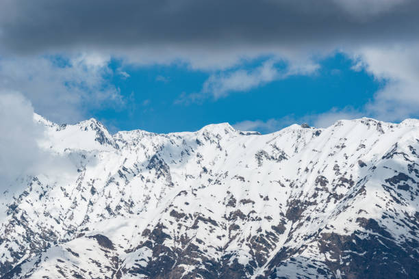 istock Clouds above the peaks of Caucasus mountains. 1437960498