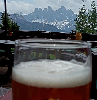 Drinking a beer on a mountain hut in the Dolomites