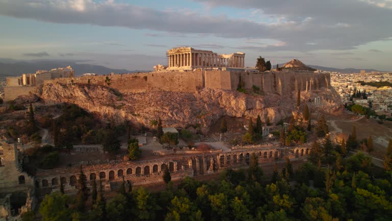 Drone bird's eye view of the Acropolis of Athens during golden hour