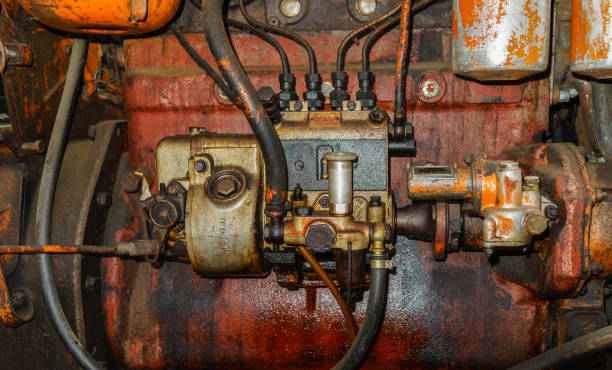 istock Old farm tractor exhibited in an agricultural fair (detail of the engine) 1437970652