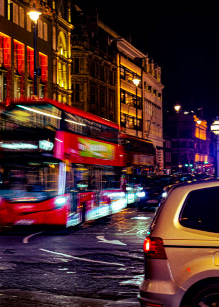 istock London bus at night in Piccadilly circus 1437974262