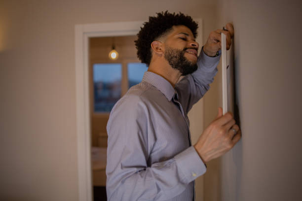 istock Young man moves into a new apartment 1437975569