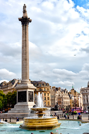 Nelson’s statue on a column and fountain in London Trafalgar Square.