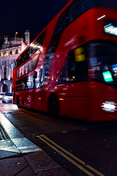 istock London bus at night in Piccadilly circus 1437975862