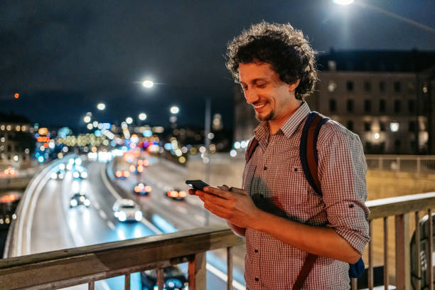 istock Young Man Using Phone In Stockholm At Night 1437977882