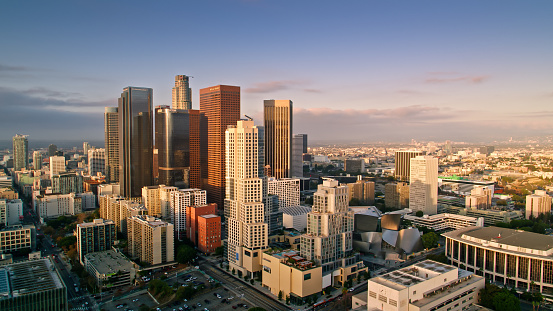 Aerial establishing shot of Downtown Los Angeles, California at sunrise.