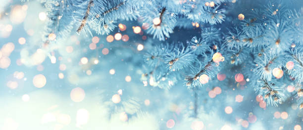 istock Christmas Tree With Snow And Garland Lights 1437982419