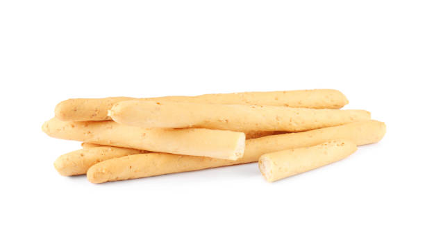 istock Delicious grissini isolated on white. Crusty breadsticks 1437982612