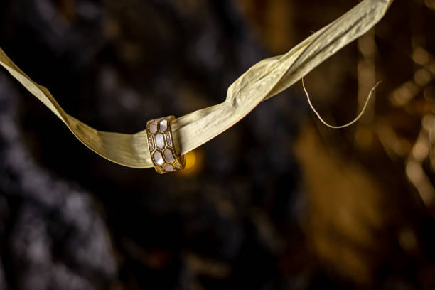istock Golden ring with diamonds, jewelry concept 1437986152