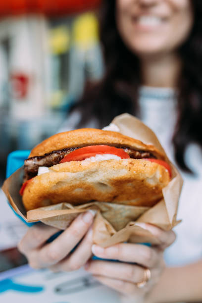 istock Holding foccacia mozzarella sandwich 1437986780