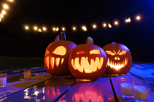 Jack O'Lanterns - Carved Pumpkins - Scary Halloween Decorations - Lanterns - Candles \n\nLit with Led lights and Candles