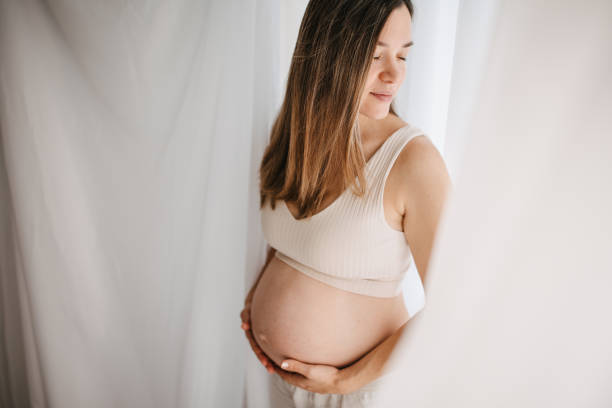 istock Beautiful pregnant woman 1437987658