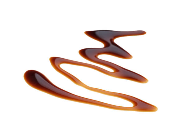 istock Smear of soy sauce spilled on white background 1437987787