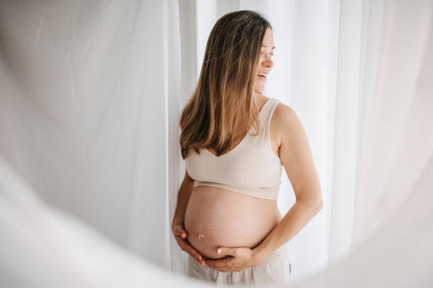 istock Beautiful pregnant woman 1437987913