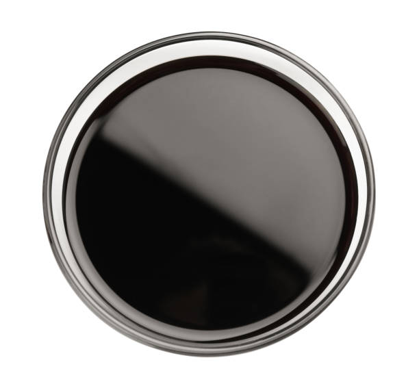 istock Bowl of soy sauce isolated on white, top view 1437988069