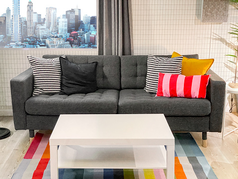 Stage set shot of a modern furnitures in a living room of a modern house