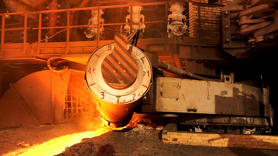 Close up for the steel furnace with temerature indicators at the metallurgical factory shop, heavy metallurgy concept. Working mechanism at the metal smelting plant.