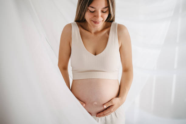 istock Beautiful pregnant woman 1437991442