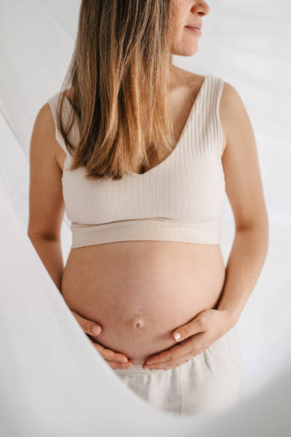 istock Beautiful pregnant woman 1437991971