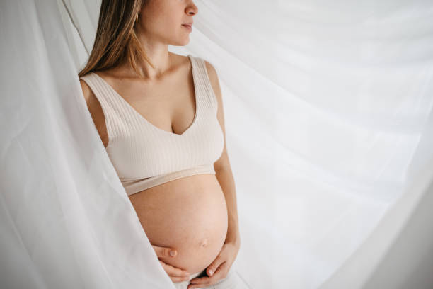istock Beautiful pregnant woman 1437991995
