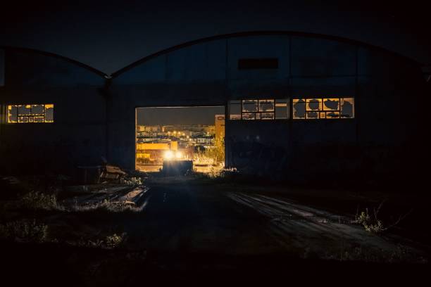 istock Illuminated abandoned warehouse at night in Portugal 1437992483