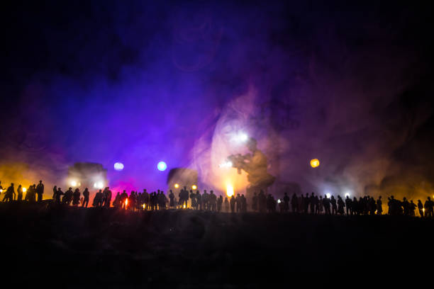 istock Creative artwork decoration war on Ukraine. Crowd looking on giant explosion and attacking soldiers. 1437994528