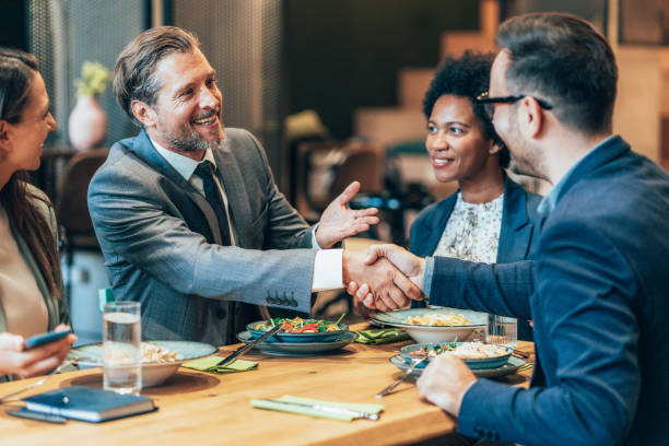 istock Business handshake at the restaurant 1437995736