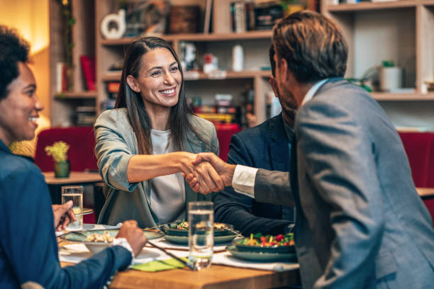 istock Business handshake at the restaurant 1437995738