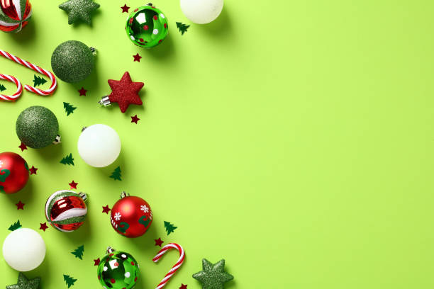 istock Green Christmas background with festive ornaments. Flat lay, top view, copy space. 1437997070