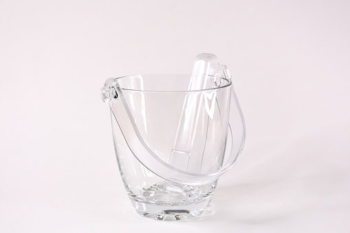 Glass ice bucket on the white background