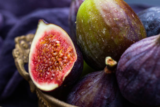 istock Closeup shot of fresh fig in a basket 1437999978