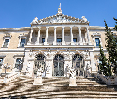 Madrid, Spain - July 9, 2022: The Biblioteca Nacional de España is a major public library, the largest in Spain, and one of the largest in the world.