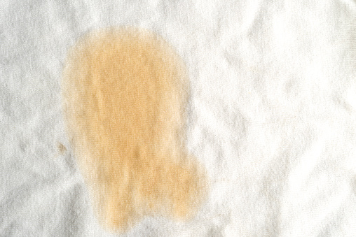 Close up view of coffee stain on T-shirt