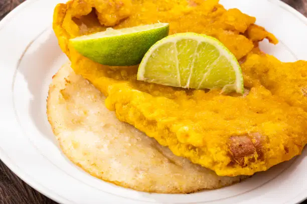 Photo of Fish torta with arepa - Colombian street food