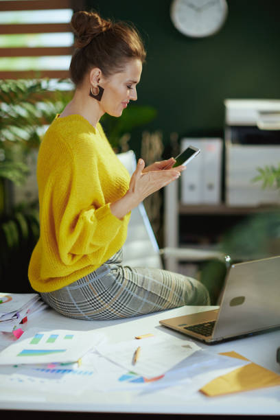 istock business owner woman using tablet PC and working with documents 1438002551
