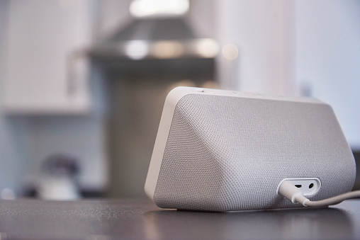 isolated wireless portable speaker with earphones for connection to listen music