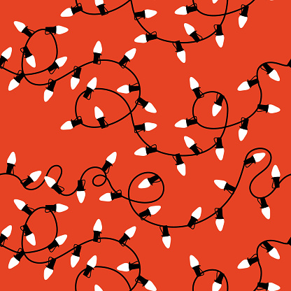 A colorful seamless pattern featuring white Christmas lights on a red background. Lights and strings are all individual elements and can be rearranged.