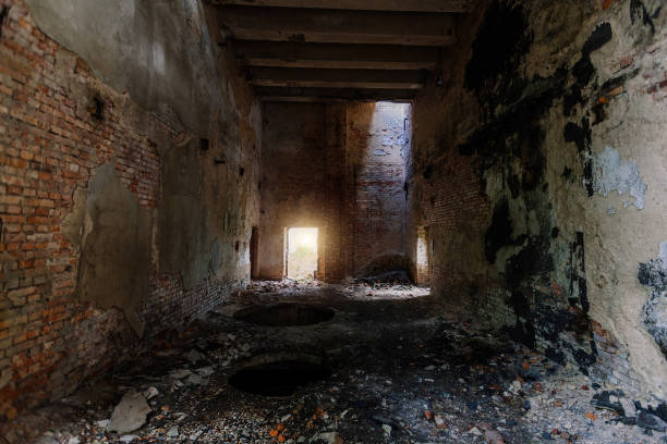 istock Old broken empty abandoned industrial building interior 1438003026