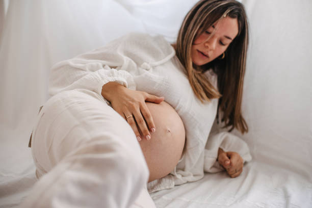 istock Beautiful pregnant woman 1438007075