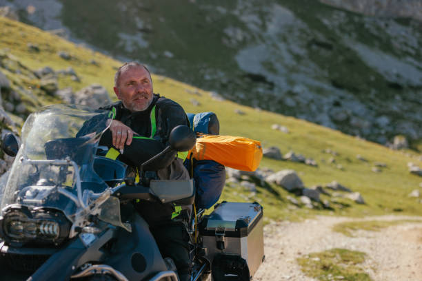 istock Bike rider resting in mountain 1438008983