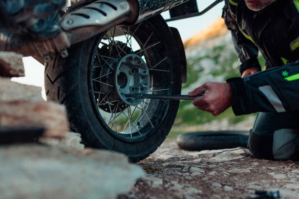 istock Biker repairing his motorcycle 1438011101